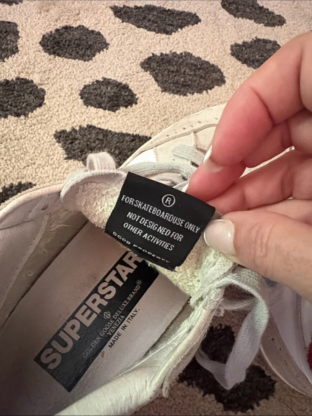 Golden Goose White Sneakers with Red Star Accent